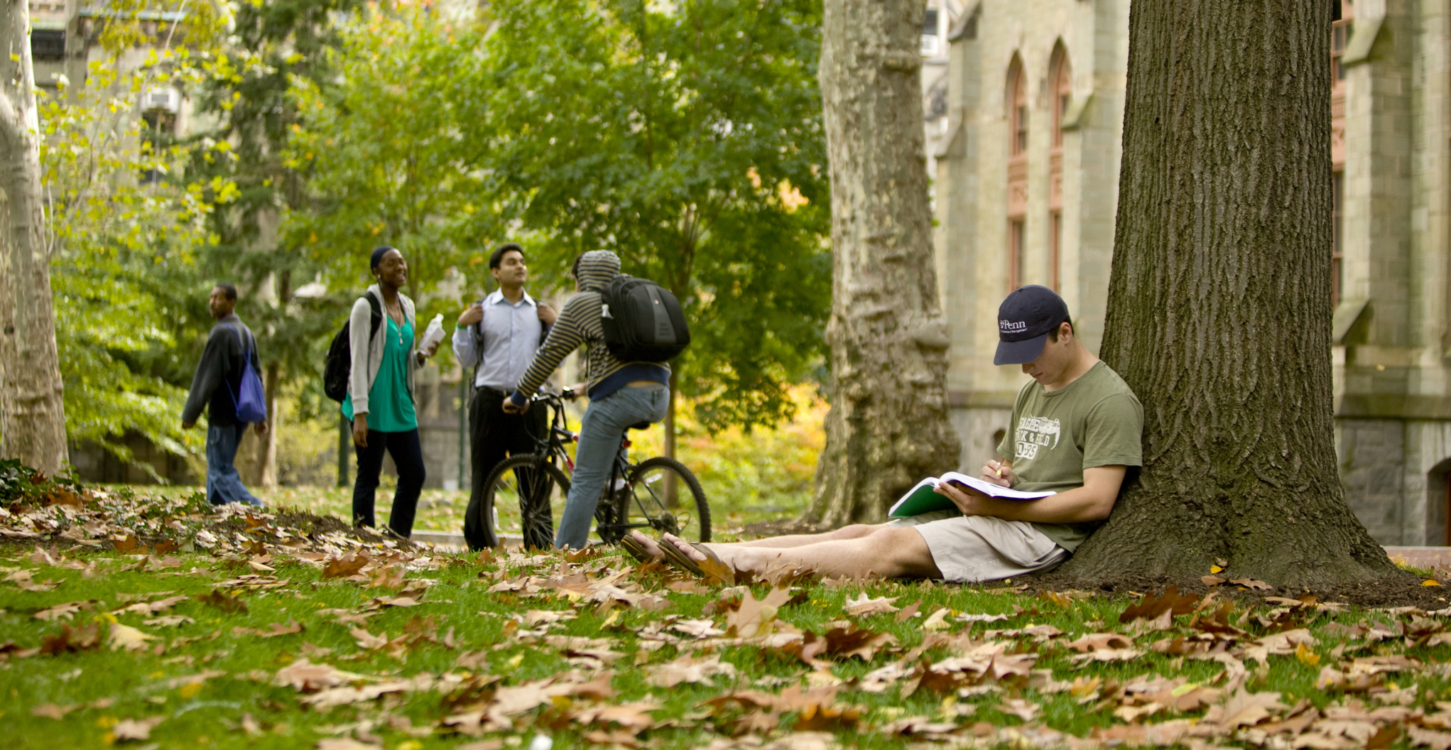 Student Sitting on Grass